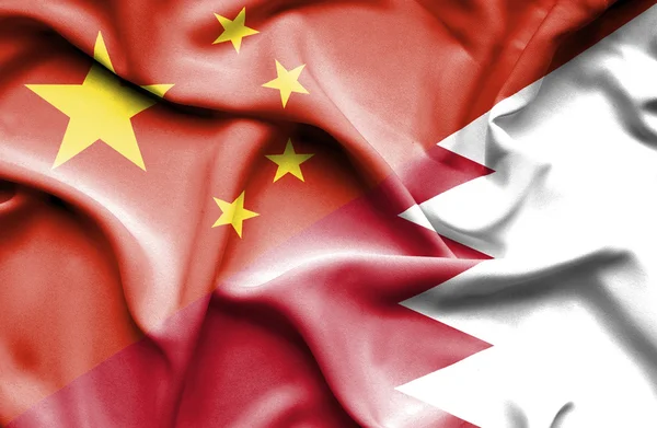 Bahrajn vlající vlajka Číny — Stock fotografie