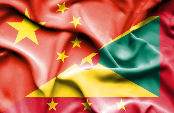 Bandeira acenando de Guernsey e China — Fotografia de Stock