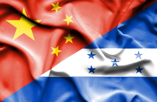 Waving flag of Honduras and China — Stock Photo, Image