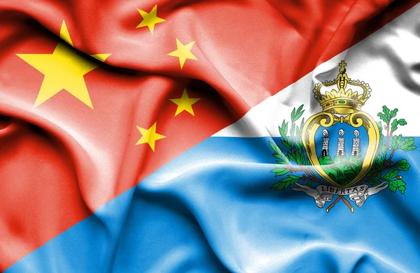 Bandeira acenando de San Marino e China — Fotografia de Stock