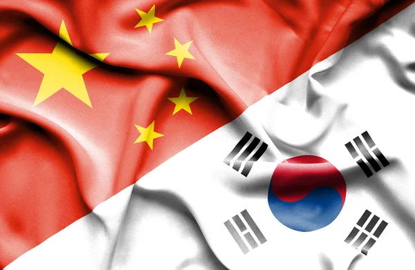 Waving flag of South Korea and China — Stock Photo, Image