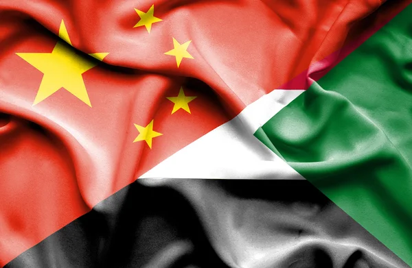 Wapperende vlag van Soedan en China — Stockfoto