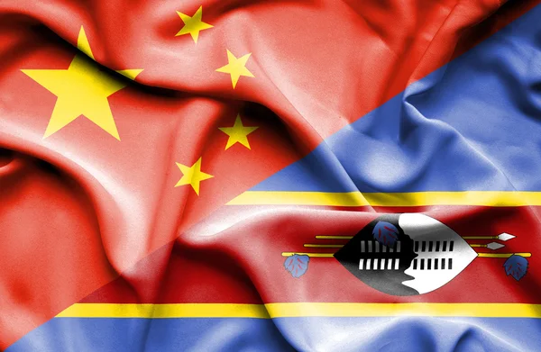 Swazliand と中国の国旗を振ってください。 — ストック写真