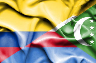 Komor Adaları ve Columbia bayrağı sallayarak