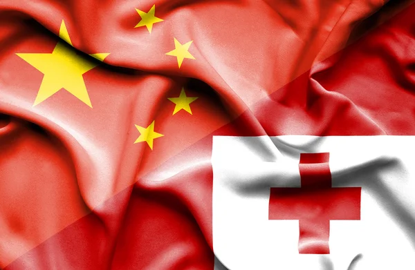 Bandeira ondulada de Tonga e China — Fotografia de Stock