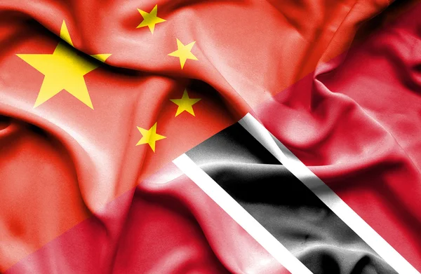 Machać flaga Trynidadu i Tobago oraz Chin. — Zdjęcie stockowe