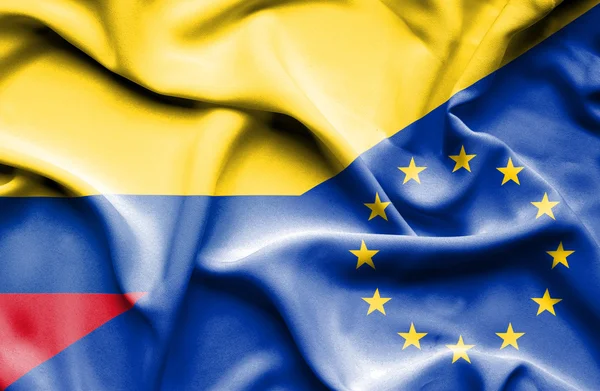 Vink med Den Europæiske Unions og Colombias flag - Stock-foto
