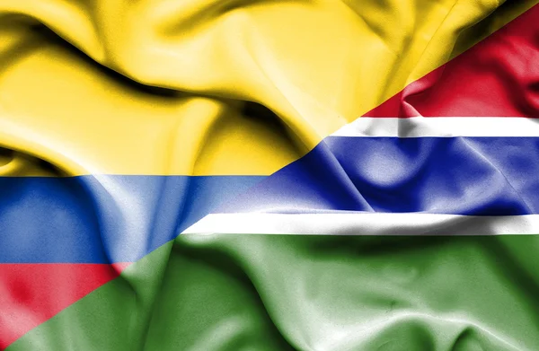 Flagge von Gambia und Kolumbien schwenken — Stockfoto