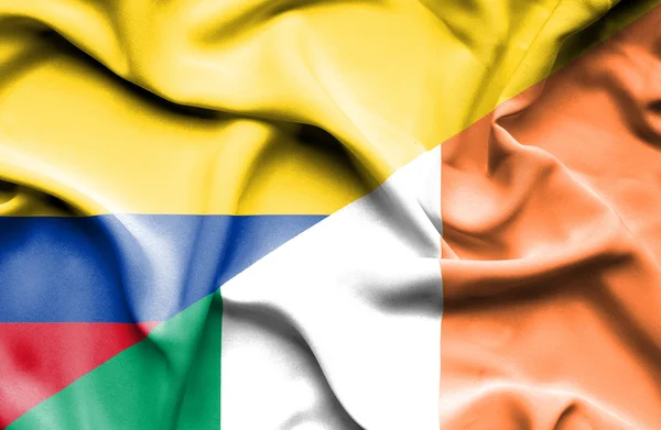 Wapperende vlag van Ierland en Colombia — Stockfoto