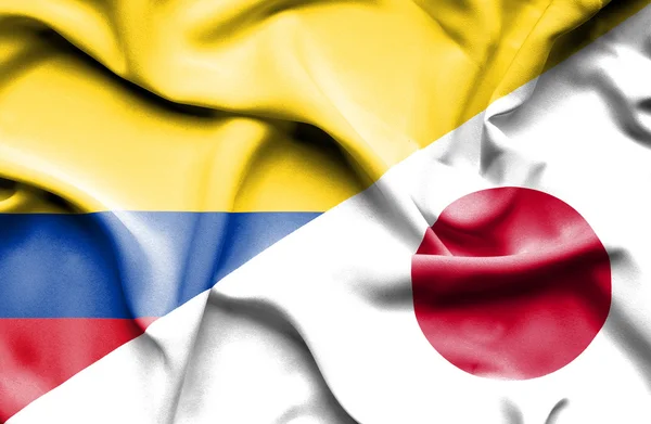 Japonya ve Columbia bayrağı sallayarak — Stok fotoğraf