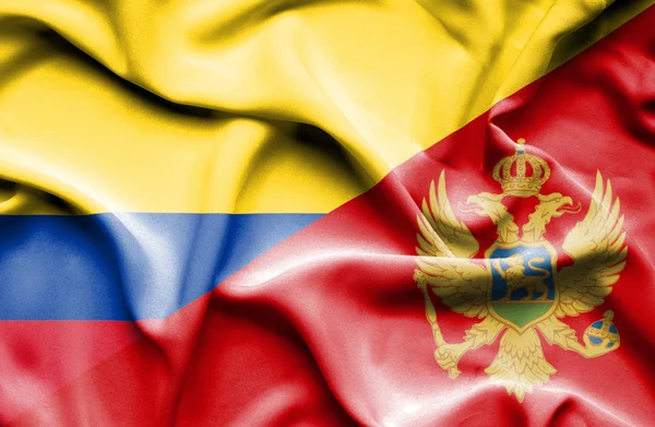 Montenegró és Columbia hullámzó zászlaja — Stock Fotó