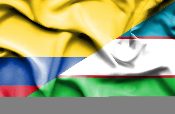 Bandeira acenando de Uzbequistão e Columbia — Fotografia de Stock