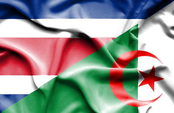 Mávání vlajkou Alžírska a Costa Rica — Stock fotografie
