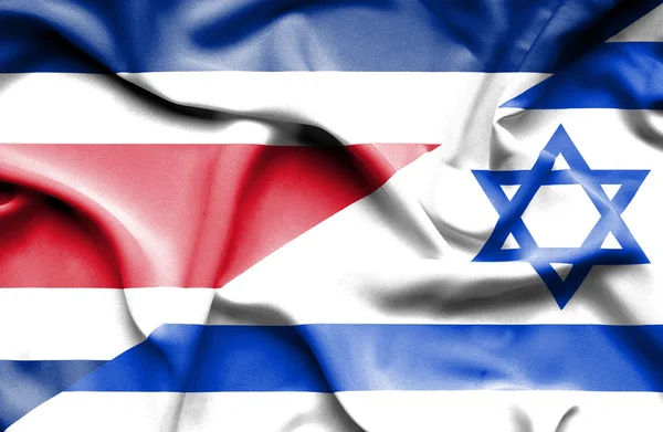이스라엘, 코스타리카의 깃발을 흔들며 — 스톡 사진