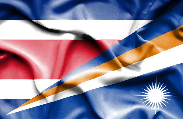 Waving flag of Marshall Islands and Costa Rica — Stock Photo, Image