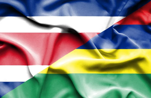 Flagge von mauritius und costa rica schwenken — Stockfoto