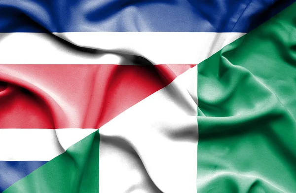 Bandera ondeante de Nigeria y Costa Rica — Foto de Stock