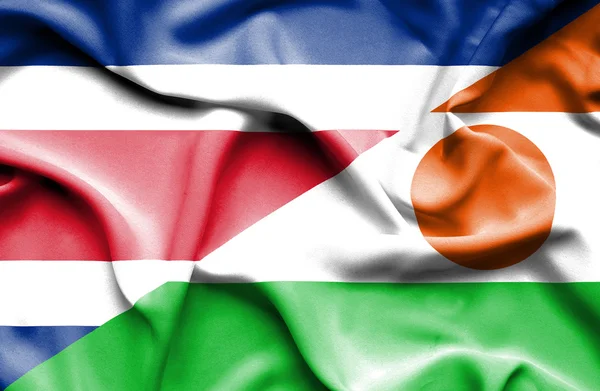 Wapperende vlag van Niger en Costa Rica — Stockfoto