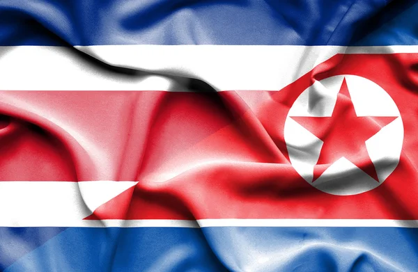 Bandera ondeante de Corea del Norte y Costa Rica — Foto de Stock