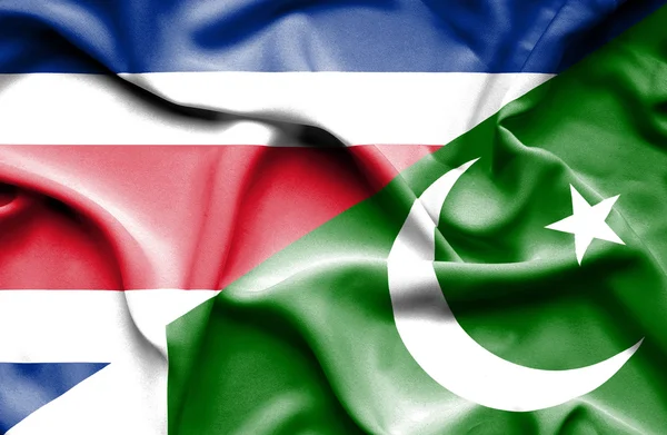 Waving flag of Pakistan and Costa Rica — Stock Photo, Image