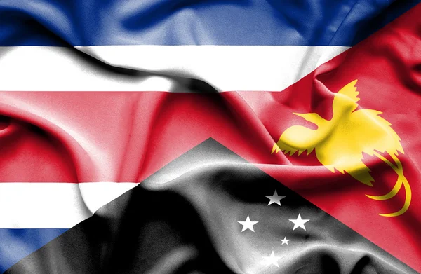 Κουνώντας τη σημαία της Παπούα Νέα Γουινέα και της Κόστα Ρίκα — Φωτογραφία Αρχείου