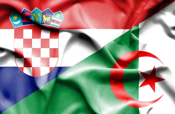 Mávání vlajkou Alžírska a Chorvatsko — Stock fotografie