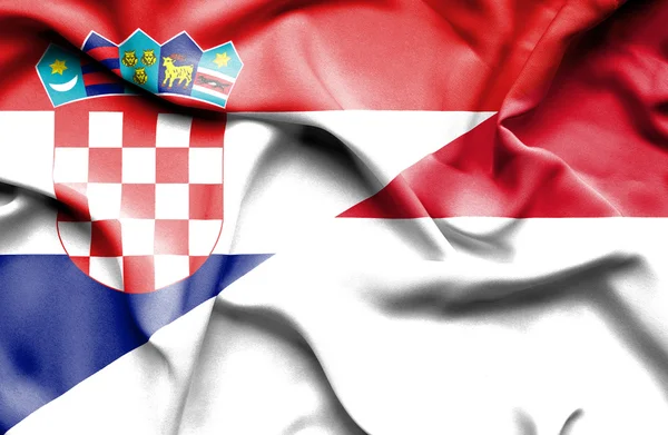 Wapperende vlag van Indonesië en Kroatië — Stockfoto