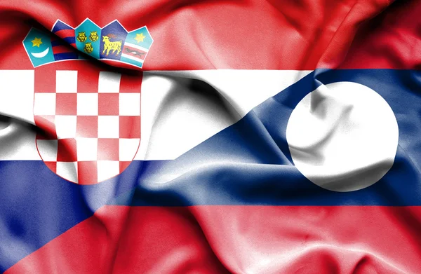 Flagge von Laos und Kroatien schwenken — Stockfoto
