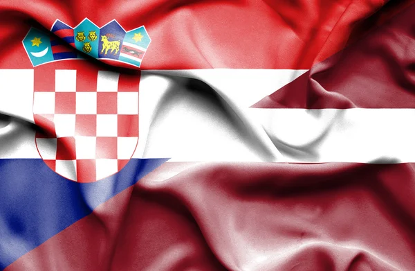 Bandeira ondulada da Letónia e da Croácia — Fotografia de Stock