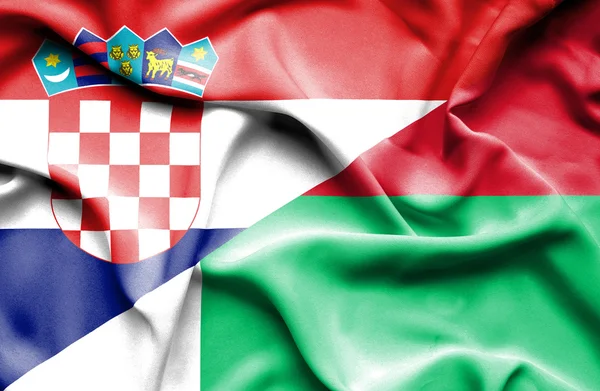 Wapperende vlag van Madagaskar en Kroatië — Stockfoto