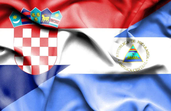 Bandera ondeante de Nicaragua y Croacia — Foto de Stock