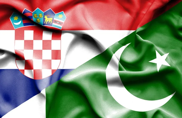 Flagge Pakistans und Kroatiens schwenken — Stockfoto