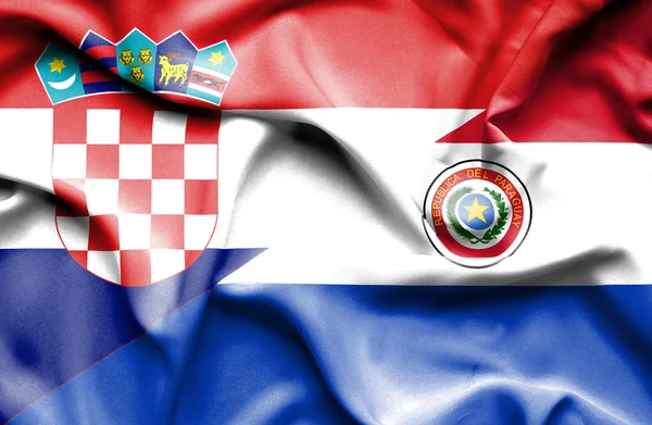 Waving flag of Paraguay and Croatia — Stock Photo, Image