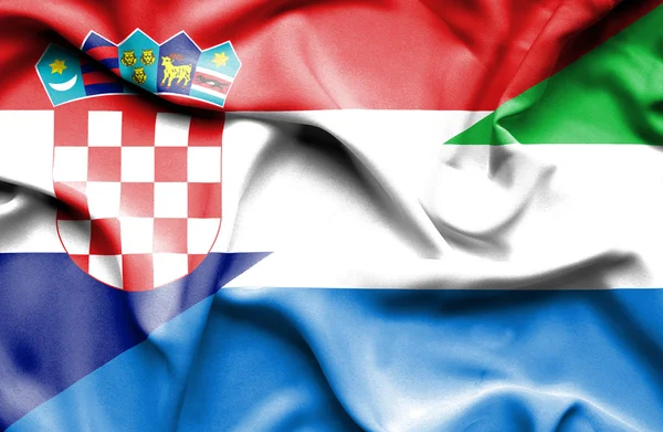 Waving flag of Sierra Leone and Croatia — Stock Photo, Image