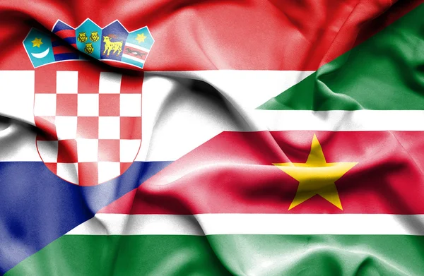 Wapperende vlag van Suriname en Kroatië — Stockfoto