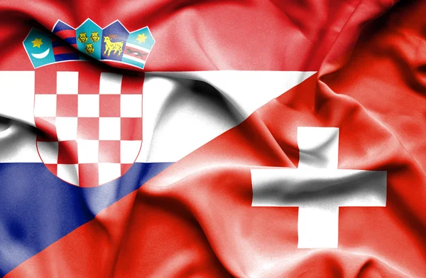 Wapperende vlag van Zwitserland en Kroatië — Stockfoto