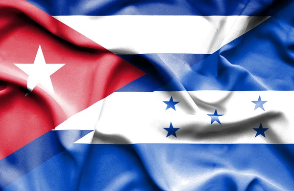 Waving flag of Honduras and Cuba — Stock Photo, Image