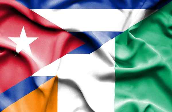 Mávání vlajkou Pobřeží slonoviny a Kuba — Stock fotografie