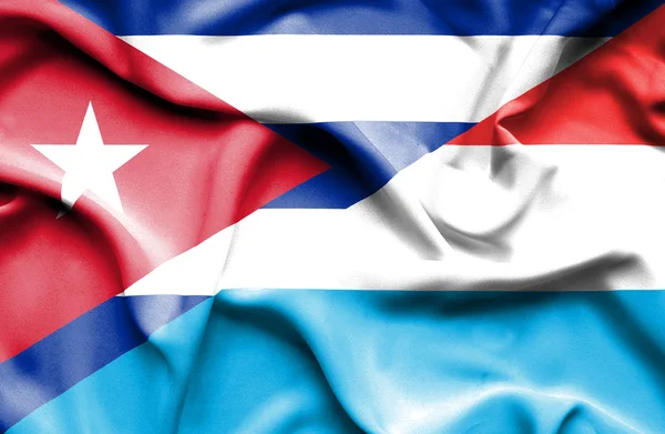 Bandera ondeante de Luxemburgo y Cuba —  Fotos de Stock