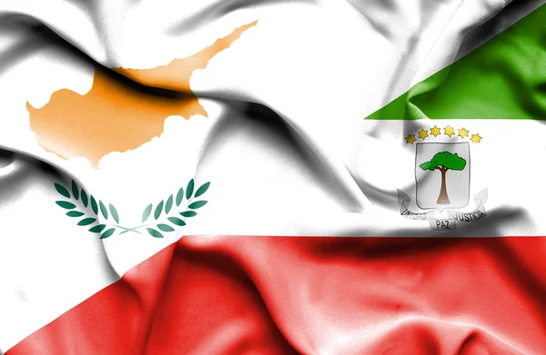 Macha flagą poprzecznego Giuinea i Cypr — Zdjęcie stockowe
