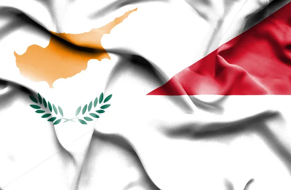 Macha flagą Indonezji i Cypr — Zdjęcie stockowe
