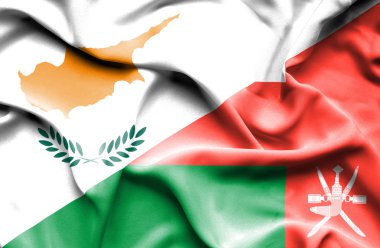 Umman ve Kıbrıs bayrağı sallayarak
