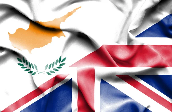 Waving flag of United Kingdon and Cyprus — Stock Photo, Image