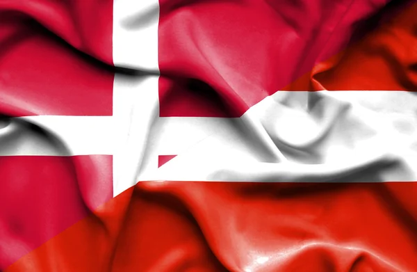 Waving flag of Austria and Denmark — Stock Photo, Image