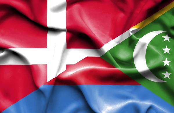 Machać flaga Komorów i dania — Zdjęcie stockowe
