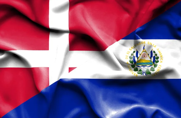 Wapperende vlag van El Salvador en Denemarken — Stockfoto