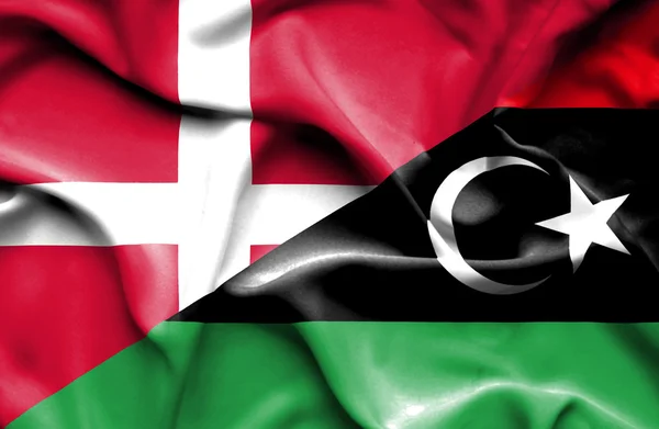 Vlající vlajka Libye a Dánsko — Stock fotografie