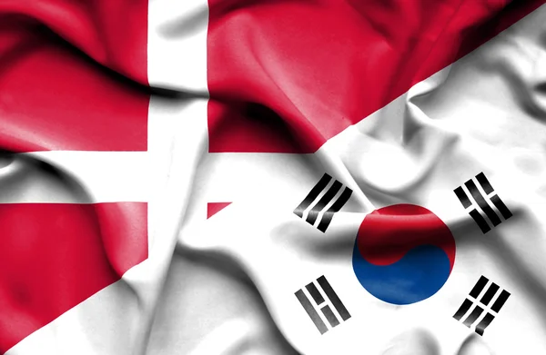 Waving flag of South Korea and Denmark — Stock Photo, Image