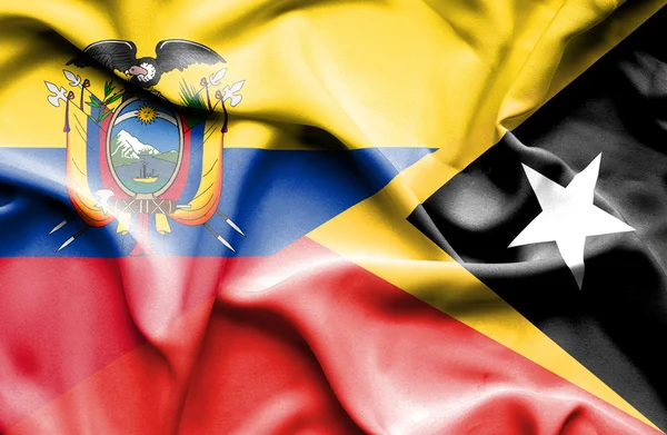 Waving flag of East Timor and Ecuador — Stock Photo, Image