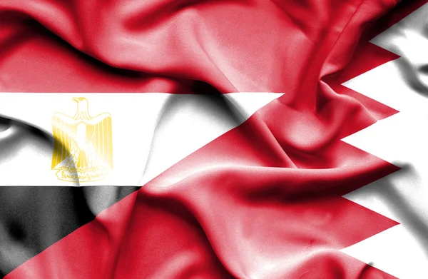 Waving flag of Bahrain and Egypt — Stock Photo, Image